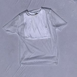 ASOS white crop tank layered with netting tee